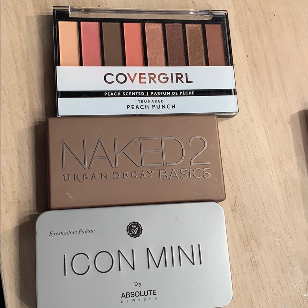 Three mini eyeshadow palettes